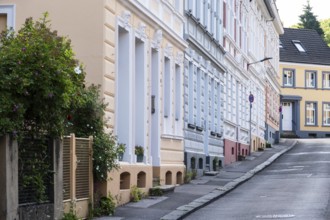 A street with apartment blocks from the Wilhelminian era in Wuppertal, Germany