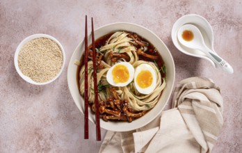 Buckwheat noodles soba with shimeji mushrooms, with boiled egg, green onion, sesame seeds,