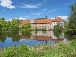 Lamspringe Monastery, reflection in the Lamme pond, Lower Saxony, Germany