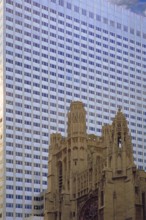 Historic St Thomas Episcopa Church, built in 1824, in front of a skyscraper, 53rd Street,
