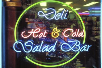 Illuminated advertising at a fast food restaurant, New York City, USA