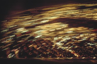 View of New York City at night from an aeroplane, blurred, USA