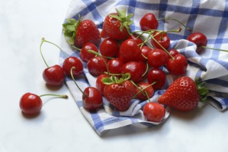 Cherries and strawberries on cloth, fruit