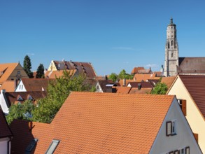 View from the medieval town wall over the houses of the historic old town to the tower of St