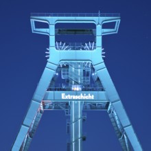 Illuminated headframe of the German Mining Museum at Extraschicht, Bochum, Ruhr area, North