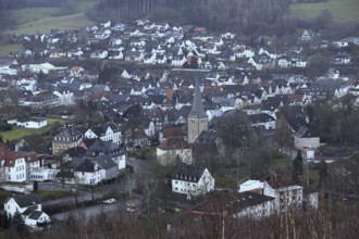 View over a town in the Sauerland... Balve on a cold and wet winter day, view from the Pius chapel