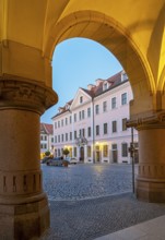 View of Hotel Börse through the arches of the New Town Hall of Görlitz, Lower Market Square -