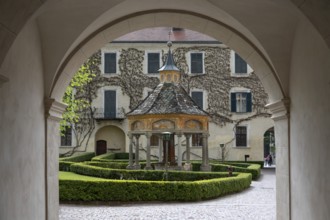 Miracle fountain, 1508, in the courtyard of the Neustift St Margarethen monastery, Vahrn, district