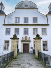View over fortified bridge over moat moat of Borbeck Castle former summer residence of prince