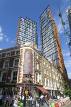 Tower block apartments of One Crown Place rise high above older properties, Sun Street, City of