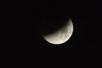 On 28.09.2015, 03:41 am... partial lunar eclipse, full moon dips into the earth's shadow, appears