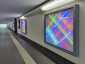 Eight light boxes by Albert Hien with neon systems in the subway at Celle railway station,