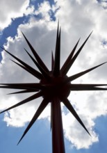 Work of art by Otto Piene entitled Fireworks for Celle as a silhouette against the light in front