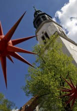 Artwork by Otto Piene entitled Fireworks for Celle in front of the tower of the town church in the