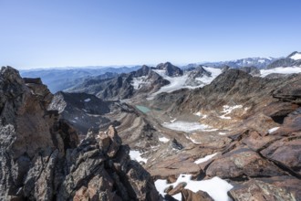 View of mountain basin with blue glacier lakes, behind summit Becher with Becherhaus, glacier