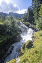 Waterfall on a roaring mountain stream, Seebach stream in the Burkhardklamm gorge, Ridnauntal