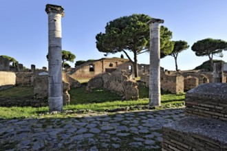 Ancient pavement of the street Cardo degli Aurighi, ruins, Ionic columns, remains, ancient port