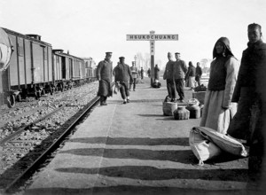 People waiting on the railway platform in Hsukochuang, China around 1900 Photograph around 1900