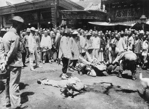 Boxer Rebellion China, execution of Chinese during the Boxer War. A Chinese man is beheaded in