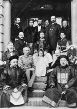 Group photo with Chinese and Austrians, China around 1900