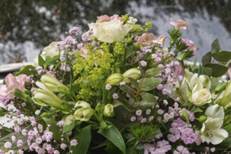 Flower arrangement on a bridal car, wedding car, raindrops, rain, MÃ¼nsterland, North