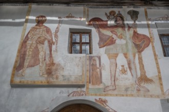 Religious frescoes on a historic farmhouse from 1602, BahnstraÃŸe, Telfes im Stubai, Austria the