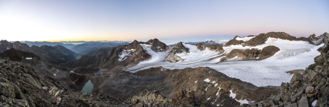 Mountain panorama, picturesque high mountain landscape at sunrise, blue glacial lakes, glaciers and