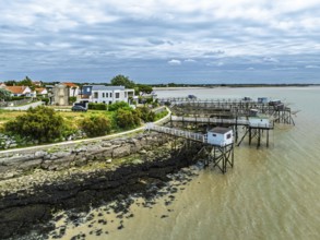 Fishing huts over Randonnee entre Histoire et Nature from a drone, Fouras, Fouras-les-Bains,