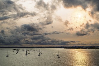 Sunset of Yachts over Ramshorn Lake and Brownsea, Poole, Dorset, England, United Kingdom