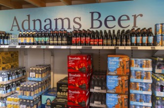 Adnams beer products on display inside brewery shop, Southwold, Suffolk, England, UK