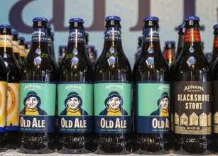 Adnams beer products on display inside brewery shop, Southwold, Suffolk, England, UK - Old Ale