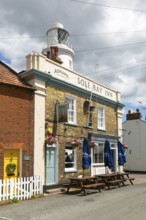 The Sole Bay Inn, historic Adnams public house next to lighthouse, Southwold, Suffolk, England, UK