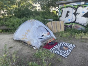 Homeless people sleeping in their tent, Yorkstrasse corner Möckernstrasse, Friedrichshain-Kreuzberg