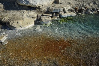 Rocky shore with clear water and different natural textures, Embros Thermal Baths, Kos, Dodecanese,