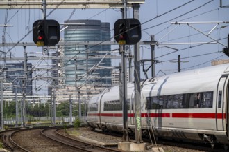 Rail traffic in the Netherlands, ICE 3neo of Deutsche Bundesbahn on the way to Amsterdam Centraal,