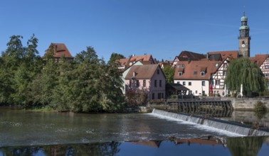View of the old town with St. Johannis Church, in front the historic Schleifmühle and Pegnitz