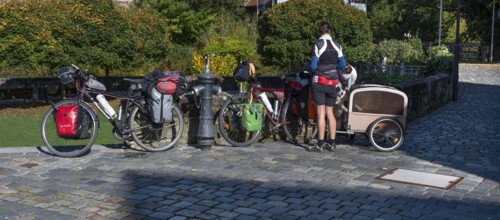 Parked bikes of a family on a bike tour, Lauf an der Pegnitz, Middle Franconia, Bavaria, Germany