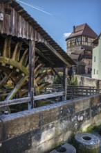 Waterwheel of the historic Schleifmühle, behind the Judenturm, built in 1430, former part of the