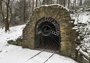 Mundloch or Stollenmundloch of the former Jupiter colliery in winter, Muttental mining hiking