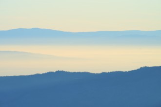 Wide mountain landscape, sunrise with soft shades of blue, view of the Rhine Valley, Hohneck, La