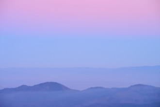 Mountain landscape with pastel-coloured sky at dusk, looking towards the Rhine Valley, Hohneck, La