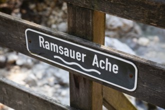 Sign on bridge over Wildbach, Ramsauer Ache, Berchtesgadener Land, Upper Bavaria, Germany