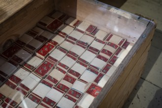 Matchbox labels are bundled in a box, Tändsticksmuseet matchstick museum or match museum,