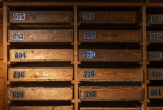 Old wooden cabinet with numbered drawers for storing match labels, Tändsticksmuseet matchstick