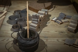 Matchboxes are glued together while working from home, historical scene, Tändsticksmuseet match