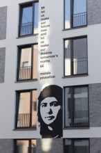 Malala Yousafzai, portrait mural and quote from the Nobel Peace Prize winner at a student
