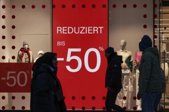 Close-sale shop window of a clothing store, reduced by up to 50 percent, Düsseldorf, North
