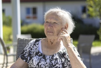 Thoughtful 86-year-old woman, retirement home, Jettingen, Baden-Württemberg, Germany
