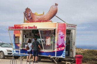 Food truck selling 'last Bratwurst before America', cape Cabo de Sao Vicente, Algarve, Portugal