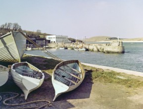 Fishing boats in the harbour at Padstow, Cornwall, England, 1960s